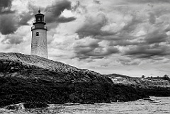 Moose Peak Lighthouse On Rocky Shore in Maine -BW